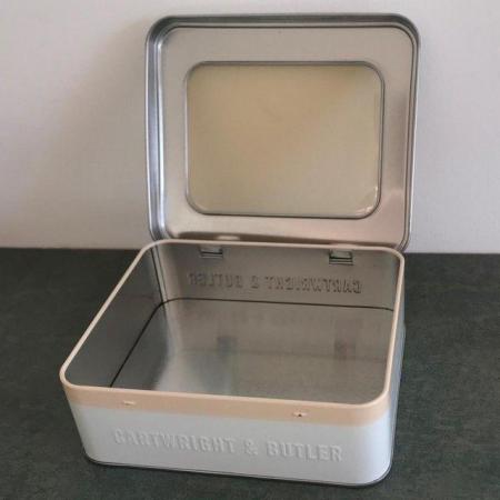 Image 3 of Cream Cartwright & Butler tin, hinged lid with 'window'.