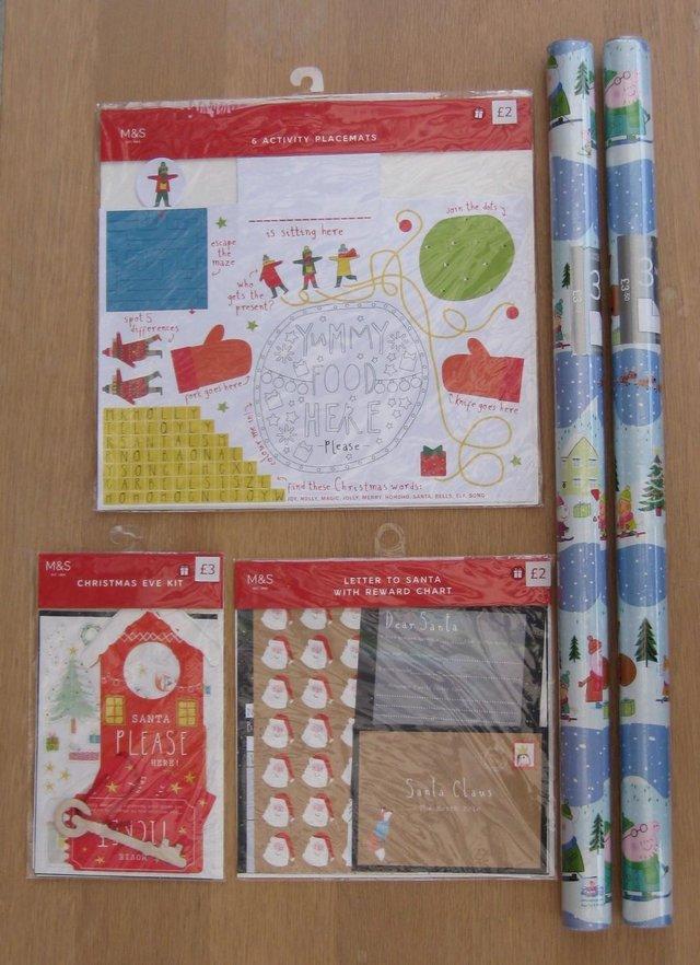 Preview of the first image of M&S Peppa Pig Wrapping Paper x 2 Christmas Santa Kits Place.