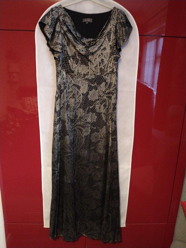 Preview of the first image of Silver/black evening dress. M & S.