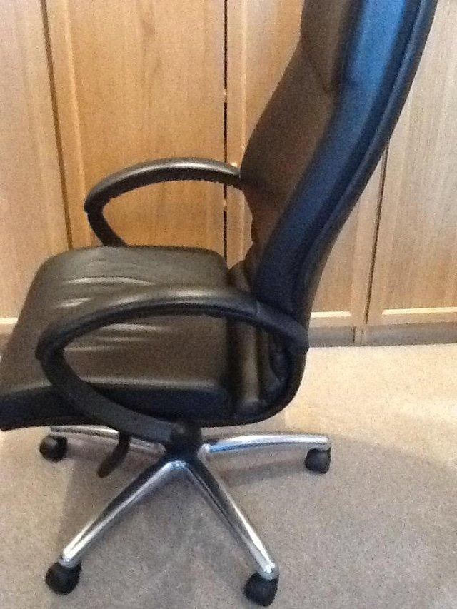 Preview of the first image of OFFICE/DESK CHAIR - BLACK LEATHER ADJUSTABLE.