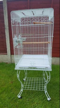 Image 11 of Large bird cage with stand , comes with perches , feeders
