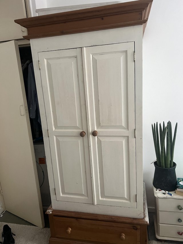 Preview of the first image of Wooden pine wardrobe with big drawer.