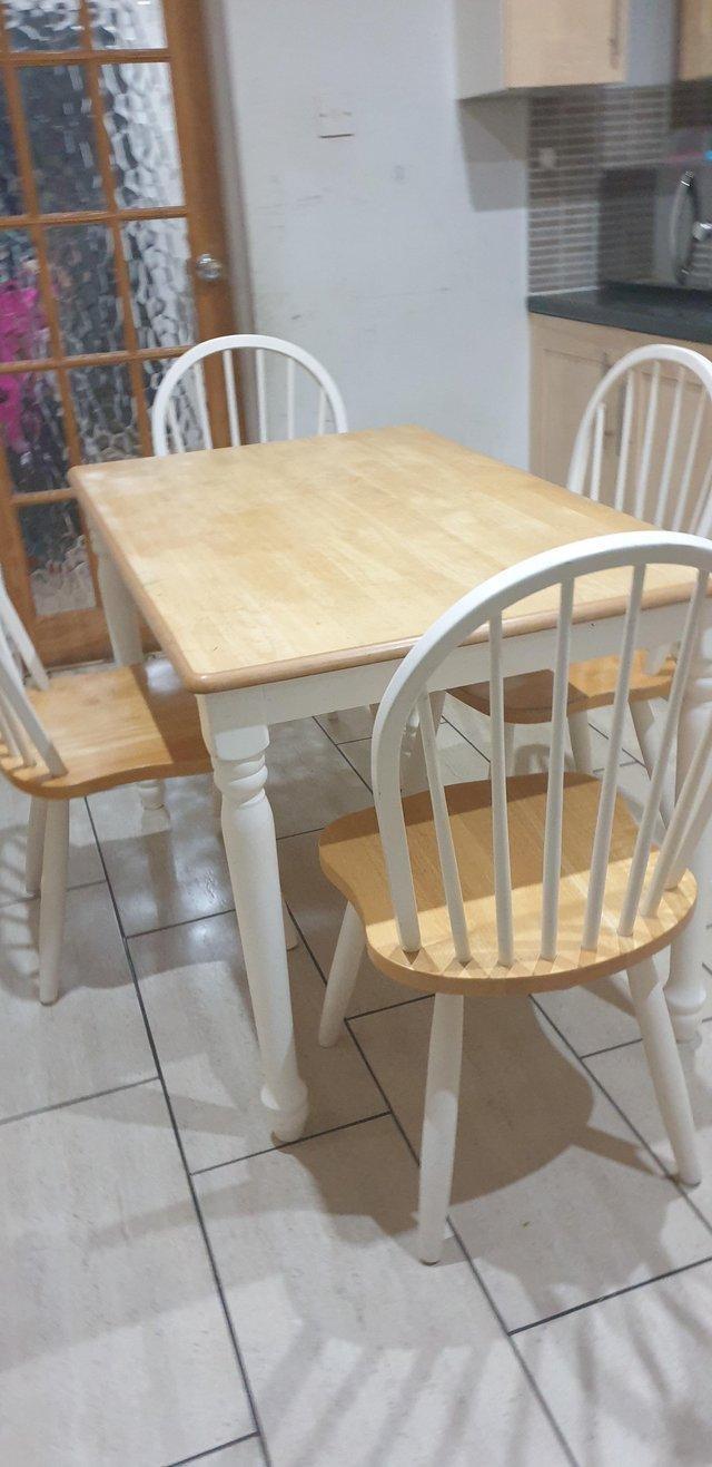 Preview of the first image of Compact country style dining table.