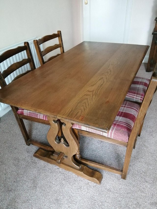 Preview of the first image of Solid Oak Refectory Old Charm Dining Table and Chairs.