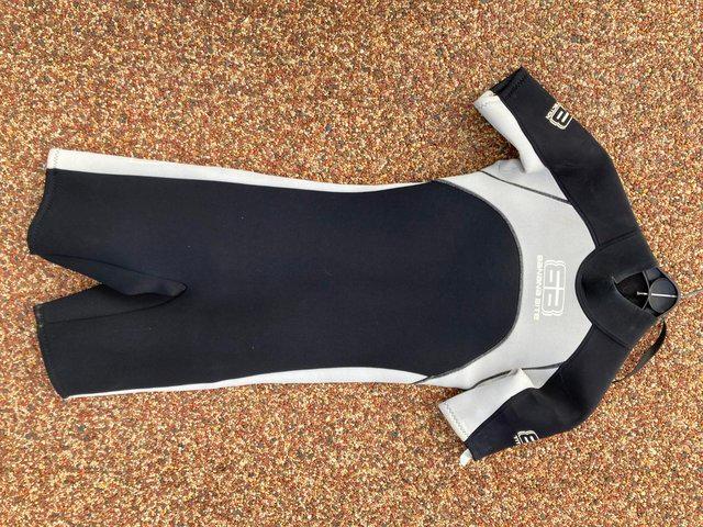 Preview of the first image of Banana Bite LM men's wetsuit shorty vgc.