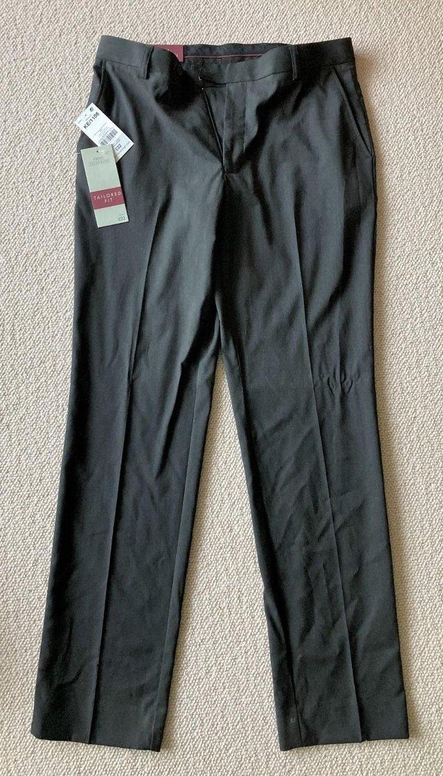 Preview of the first image of BNWT NEXT FORMAL GREY SCHOOL WORK SUIT TROUSERS 34" WAIST.