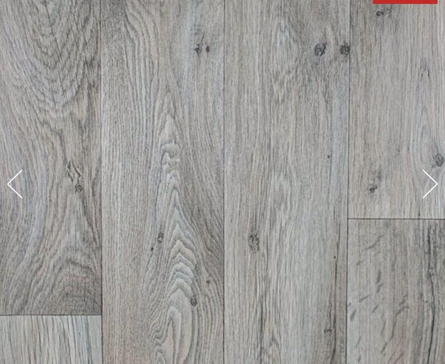 Preview of the first image of Brand new grey wood effect vinyl flooring..