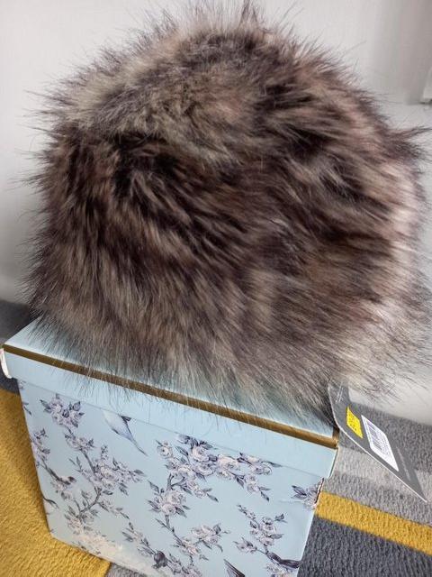 Preview of the first image of Ladiesfaux fur hat by Helen Moore.