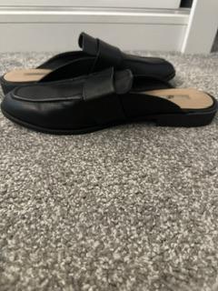Preview of the first image of Black primark faux leather loafer/mules.