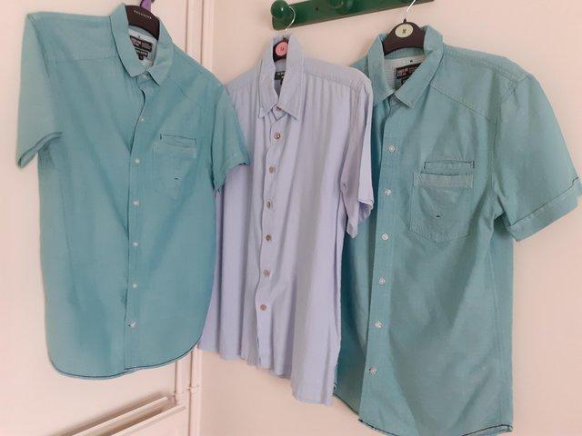 Preview of the first image of 3 Men's short sleeve shirts all three (medium).