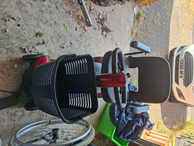 Battery operated wheelchair — photo 2 of 3