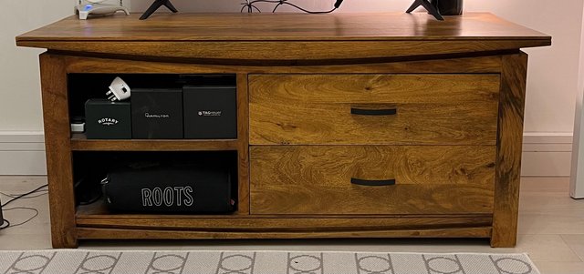 Preview of the first image of Mango wood TV stand in mint condition.