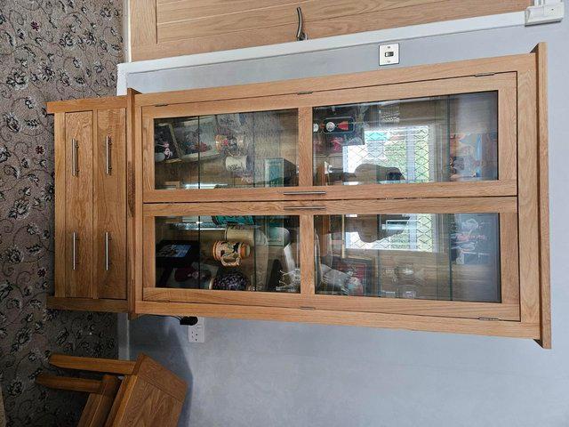 Preview of the first image of Harwell Oak Display Cabinet with Glass Shelves.