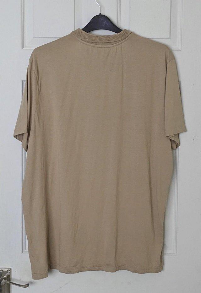 Preview of the first image of Lovely Mens Light Brown T Shirt By George - Size 2XL.