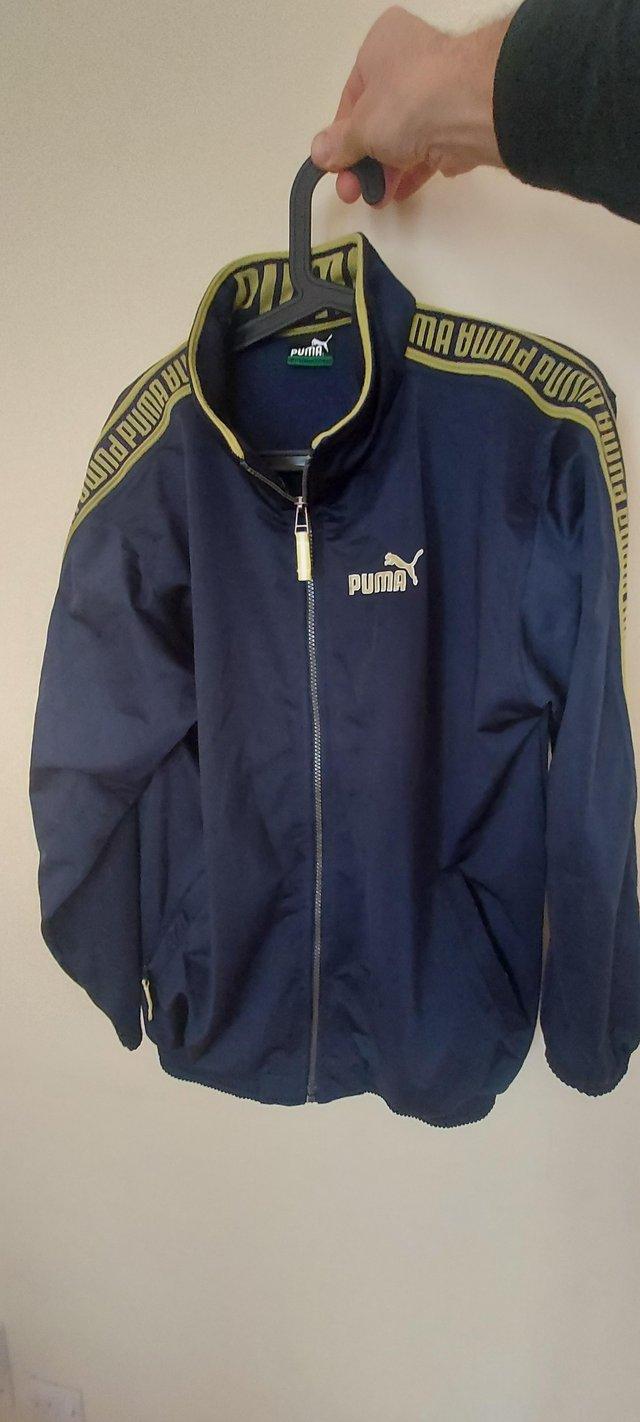 Preview of the first image of Puma lightweight zip up jacket..