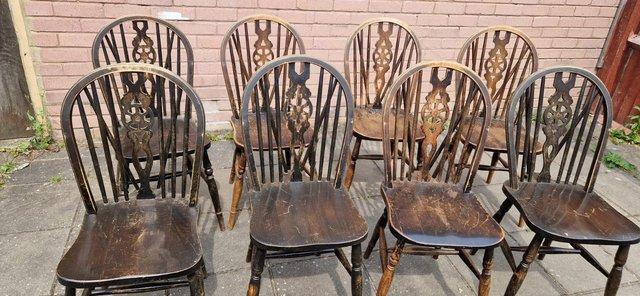 Preview of the first image of Mid Century wheelback farmhouse wooden dining chairs x 8.