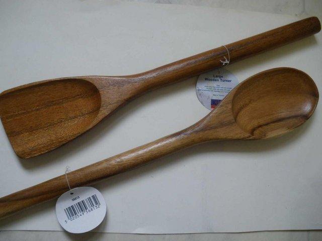 Preview of the first image of Cargo Homeshop 12.5" Wooden Large Carved Spatula.