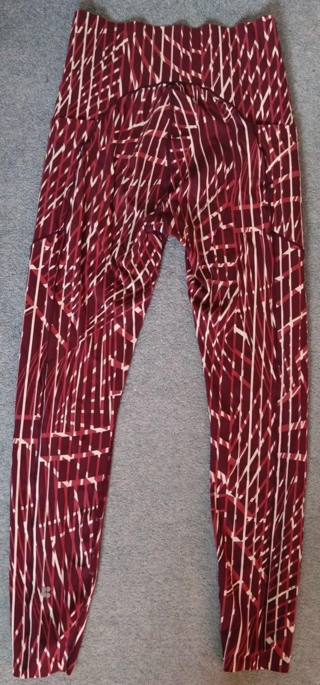 Preview of the first image of Sweaty Betty Power High-Waisted Gym Leggings Size Small, Red.