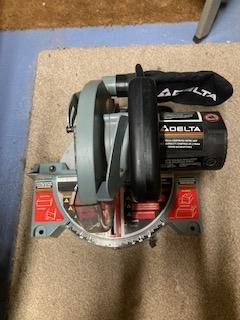 Image 3 of Delta Compound Miter 210 saw, only used a few times