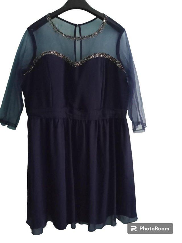 Preview of the first image of Sheer Embellished Yoke Dress Navy.