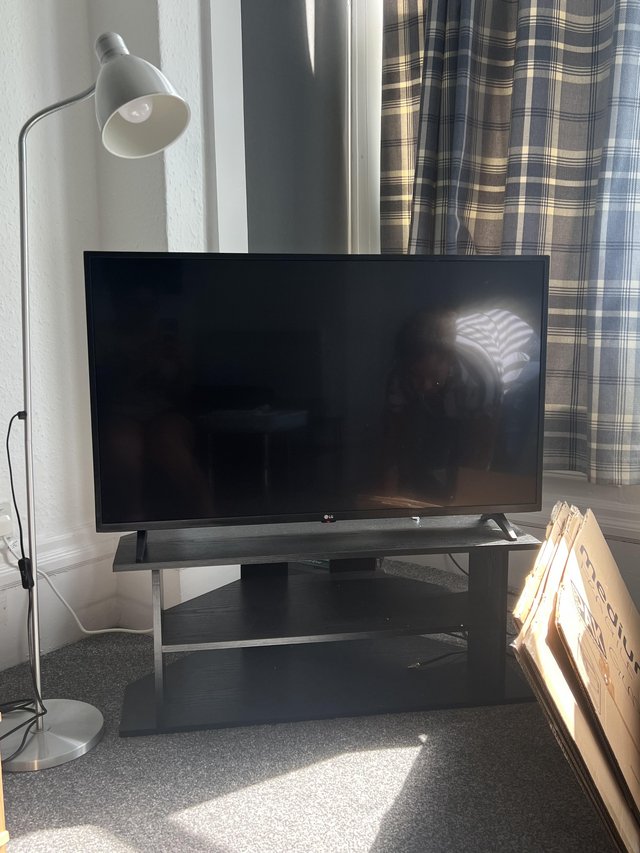 Preview of the first image of LG 43” Smart 4K TV - with TV stand included.