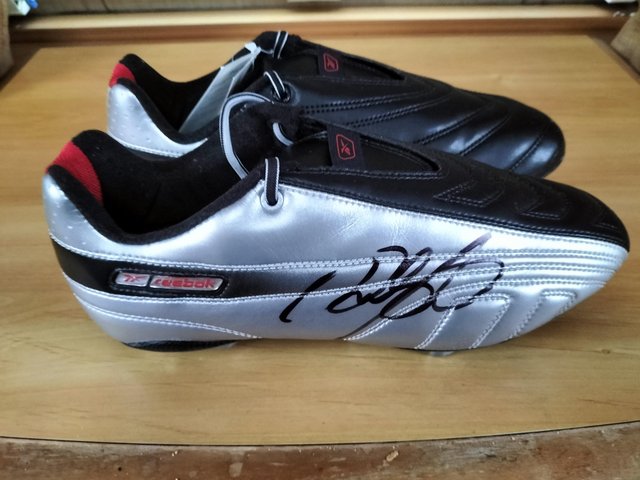 Preview of the first image of Ryan Giggs Signed football boots.
