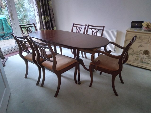 Preview of the first image of Dining room table and chairs..