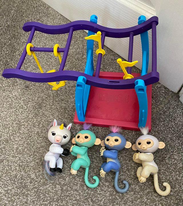 Preview of the first image of Four Fingerlings and playset..