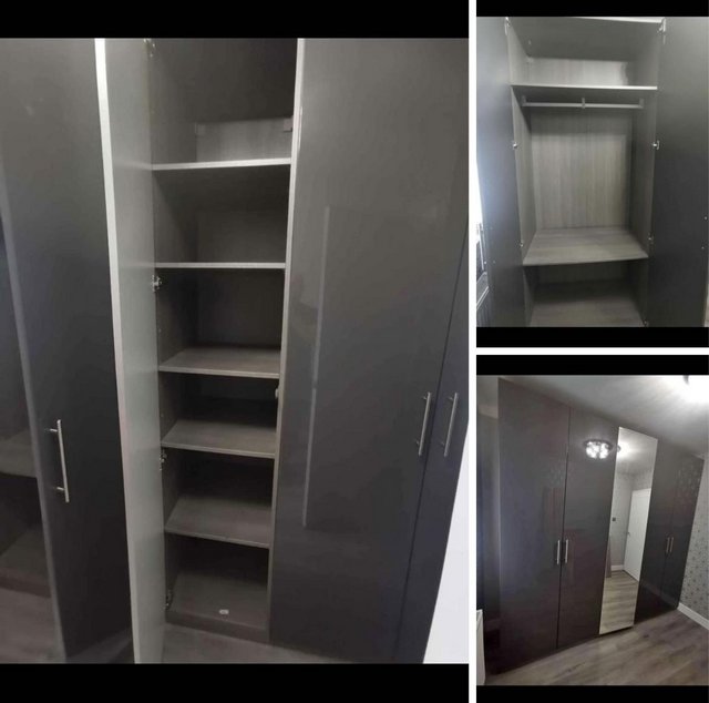 Preview of the first image of Large Grey 5 Door Wardrobe.
