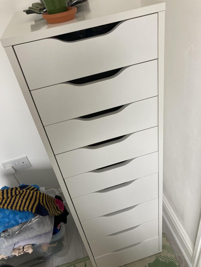 Preview of the first image of White furniture unit used with marks.