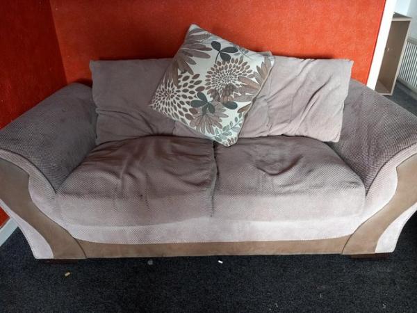 Image 1 of Large cushioned three seater sofa.