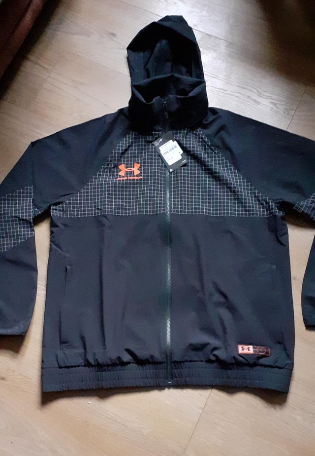 Preview of the first image of Bnwt Under armour mens size m track jacket.