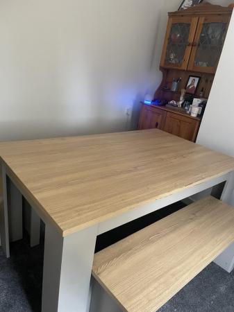 Image 1 of Dining table and matching benches