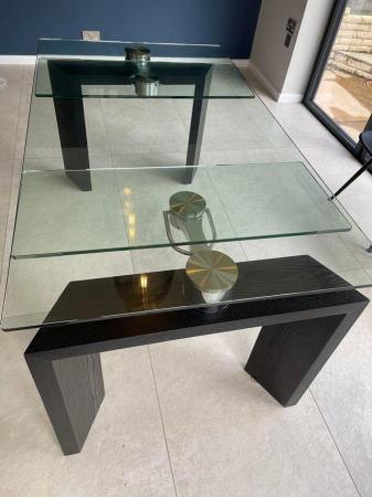 Image 2 of Glass and dark grain wood extending dining table