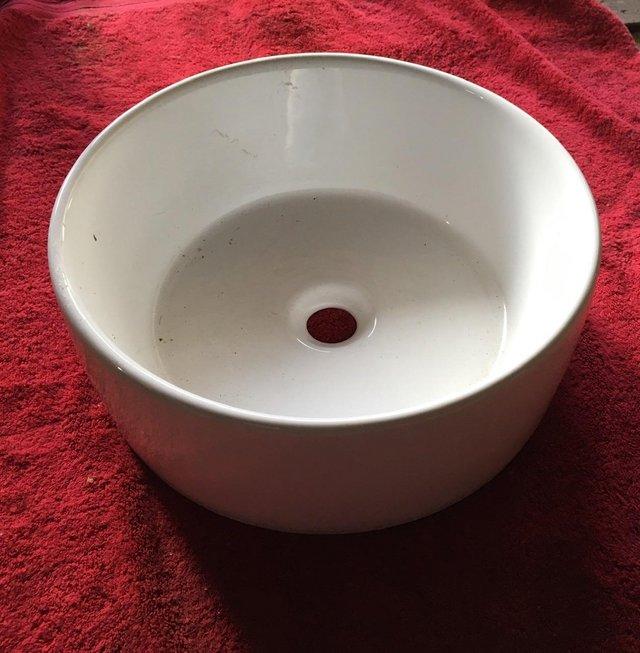Preview of the first image of Circular white Ceramic wash basin.