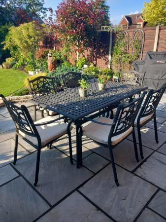 Image 1 of Garden dining table and 6 chairs