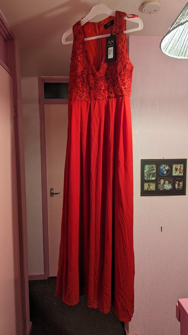 Preview of the first image of Size 14 prom dress brand new.