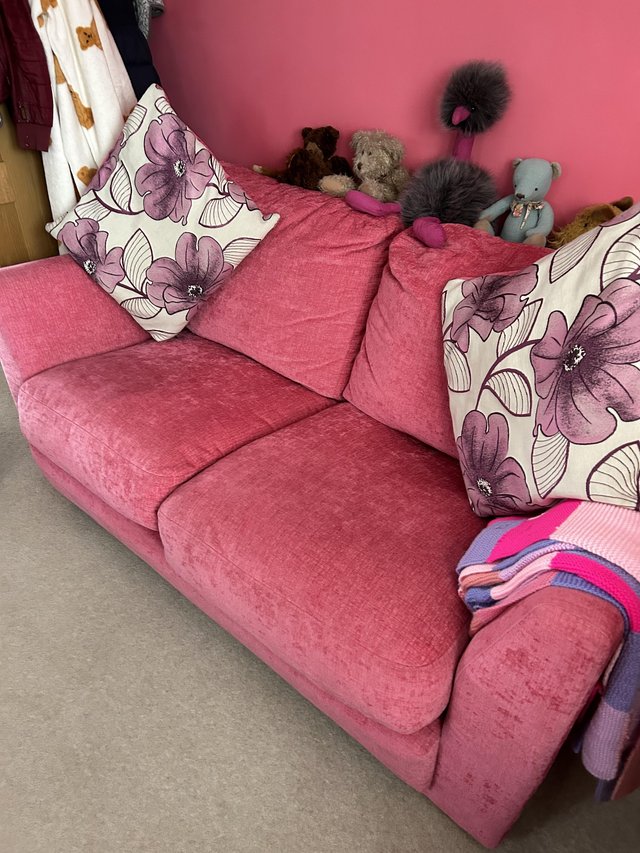 Preview of the first image of Harvey’s pink velour 2 seater sofa excellent condition.