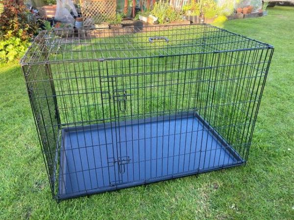 Image 1 of Large Dog crate in as new condition.