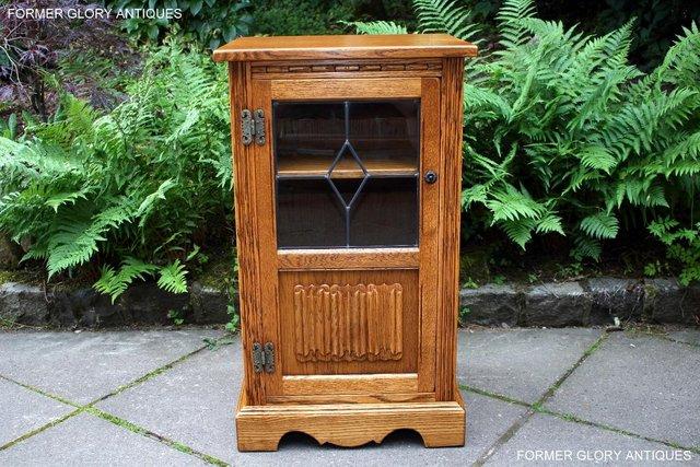 Preview of the first image of OLD CHARM VINTAGE CARVED OAK HI FI CABINET MUSIC MEDIA STAND.