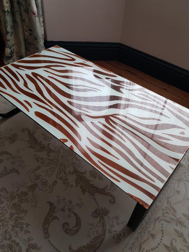 Preview of the first image of Zebra effect Coffee table/glass top.