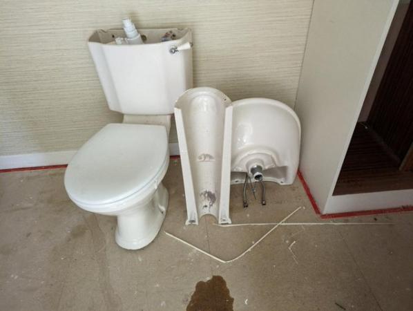 Image 1 of Bathroom toilet and sink with fittings