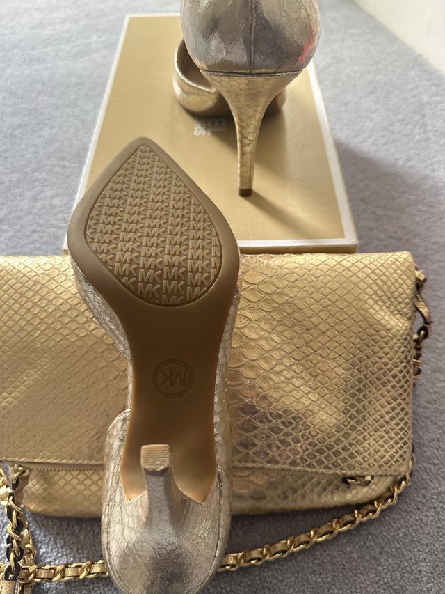 Preview of the first image of michael kors wedding shoes and bag.