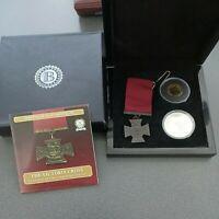 Preview of the first image of replica victoria cross and gold and silver coins.