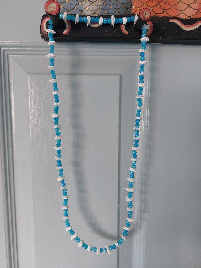 Preview of the first image of Blue/white beaded necklace.