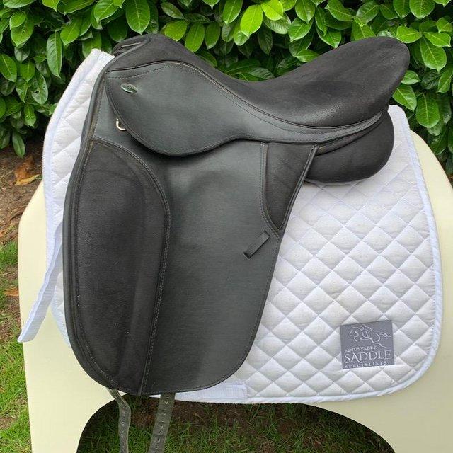 Preview of the first image of Thorowgood T4 17 inch high wither dressage saddle.