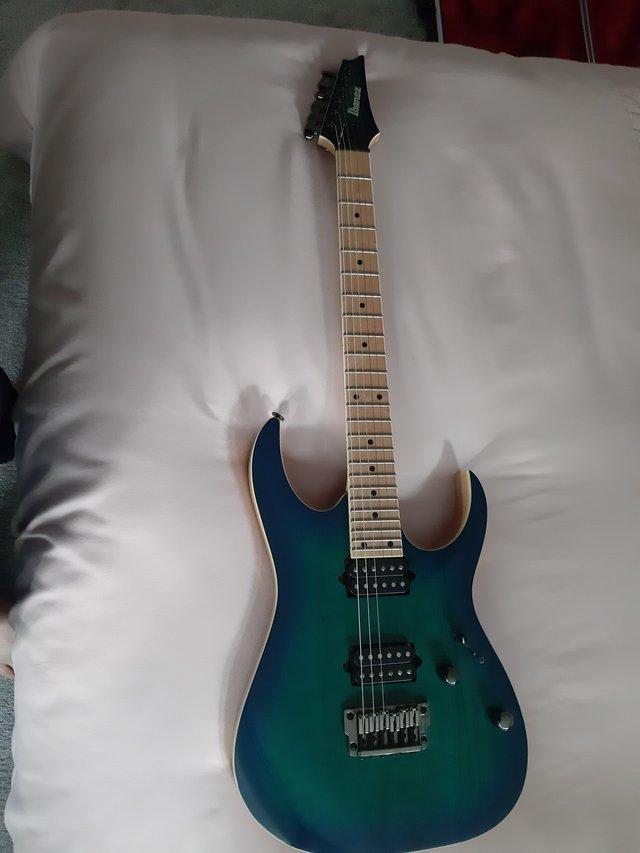 Preview of the first image of Ibanez rg 652ahmfx ngb electric guitar with case.