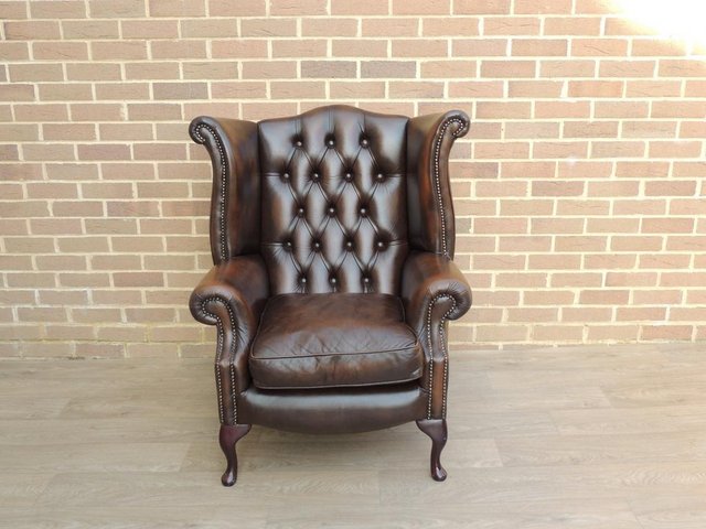 Preview of the first image of Chesterfield Luxury Brown Wingback Armchair (UK Delivery).