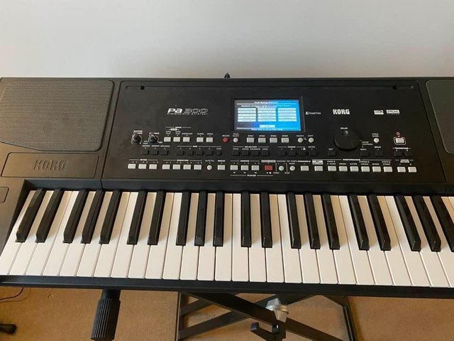 Preview of the first image of Korg PA300 personal arranger with stand.