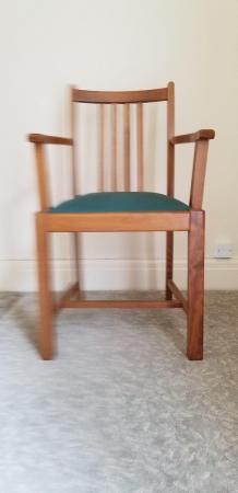 Image 1 of A single solid chair with wipable seat.